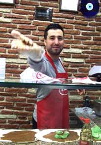 One of many unaccountably friendly people in Duzce. He was making Cig Kofte, which was amazing Turkish food