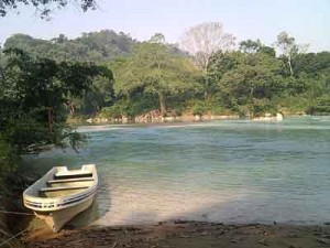A views of the incredible, painted-blue river at Agua Clara