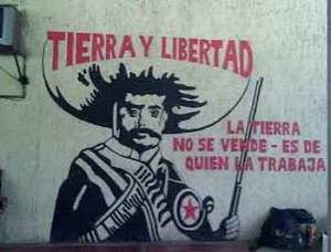 Another mural, at Agua Clara, shows Emeliano Zapata and proclaims; "The land is not for sale - it is of those who work it"