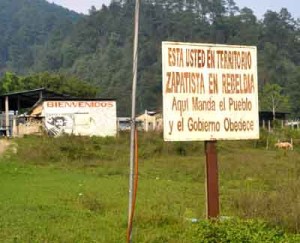The Zapatistas mark their territory with defiant signs such as this one; "Here the people demand and the government obeys"