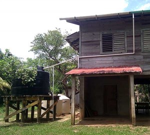 Another priority for MOPAWI is providing drinking water in Misquito communities. They are experimenting with various types of rain water collectors, such as in this picture, where pipes go from the roof of the MOPAWI centre to a tank on the left