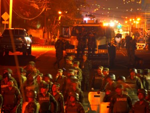 A close up shows the back of the army line - 1 of their water cannon trucks