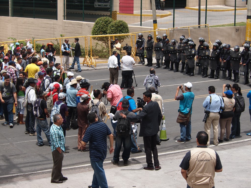 The Indigandos hunger strike protest stands off against the police this morning